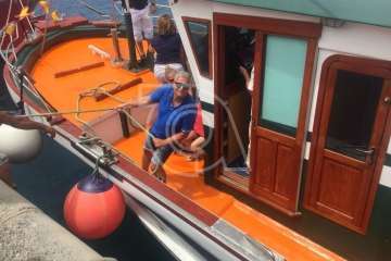 Procesión terrestre-marítimo de la Virgen del Carmen por la bahía de Melenara (Foto TA)
